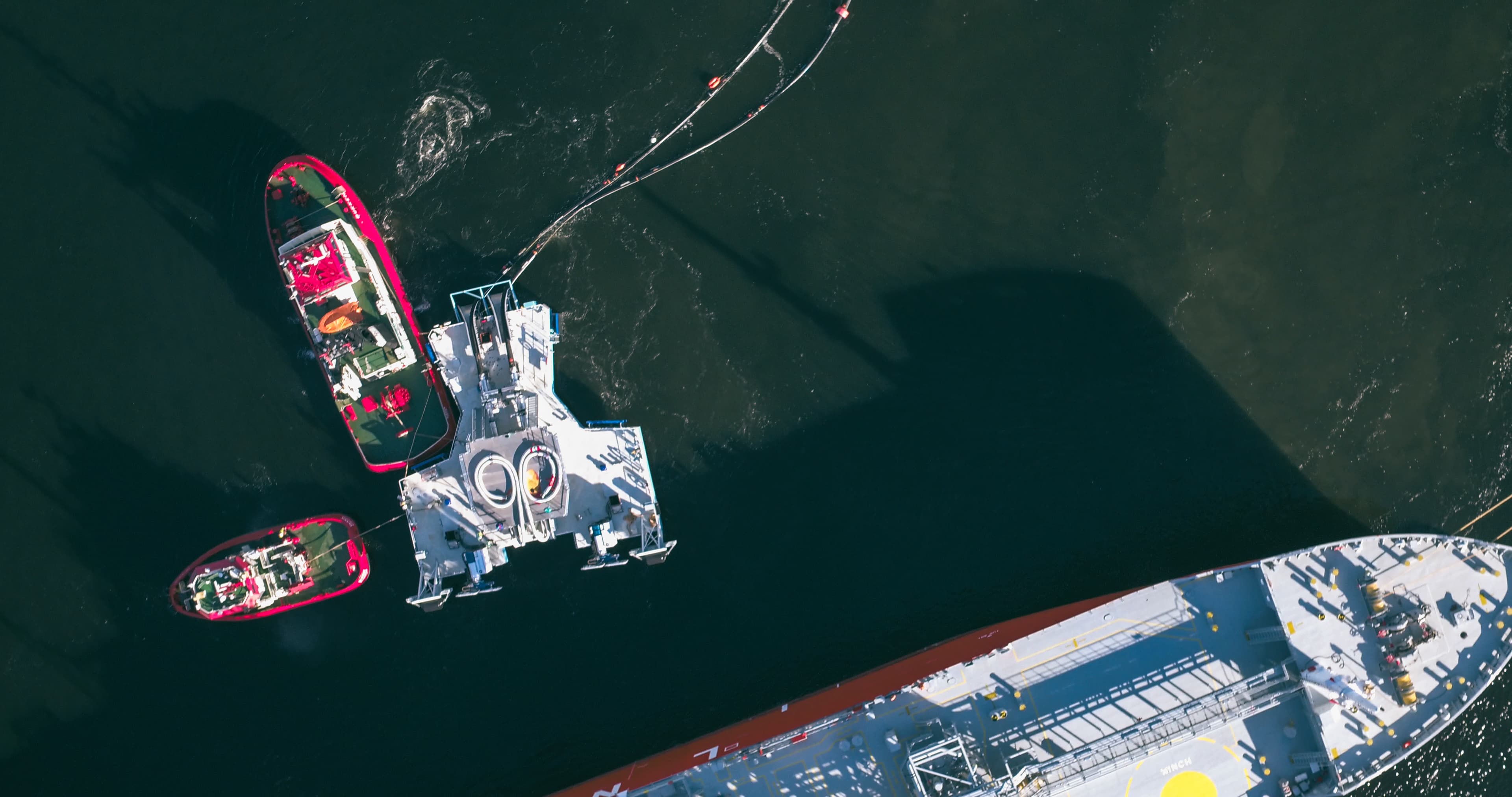 Aerial view of an IQuay jettyless transfer terminal at sea
